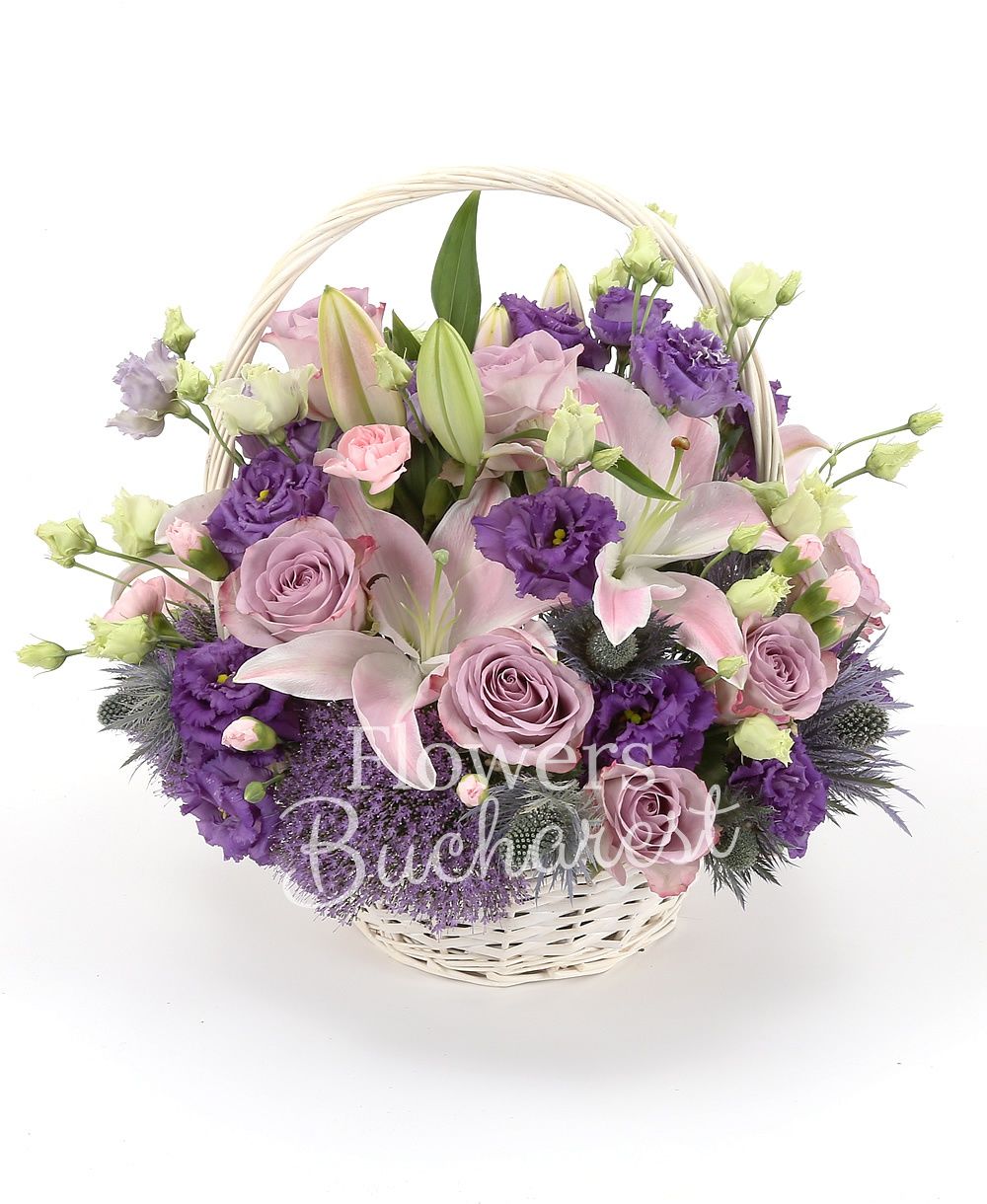 10 purple roses, 3 pink lilies, 5 purple lisianthus, 3 purple trachelium, 3 eryngium, 5 pink carnations