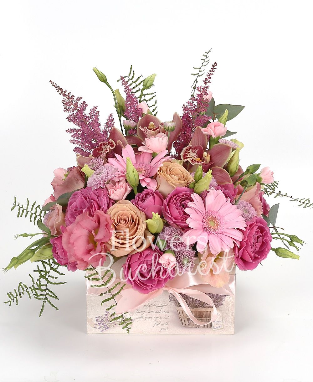 3 cappuccino roses, 2 pink gerbera, 3 cyclam miniroses, 3 pink lisianthus, 2 pink santini, 3 garnet astilbe, garnet cymbidium, pink carnations, greenery