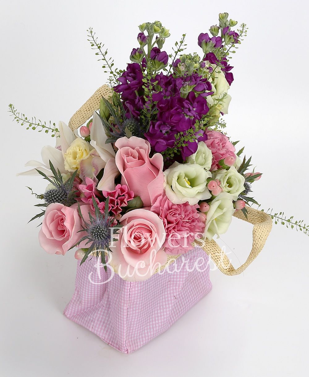 3 pink roses, 3 purple mathiolla, white cymbidium, 2 white ornithogalum, 2 pink carnations, eryngium, 2 pink hypericum, 2 pink bouvardia, white lisianthus