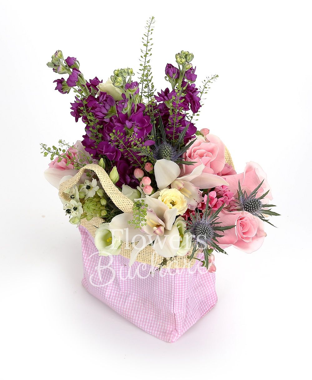 3 pink roses, 3 purple mathiolla, white cymbidium, 2 white ornithogalum, 2 pink carnations, eryngium, 2 pink hypericum, 2 pink bouvardia, white lisianthus