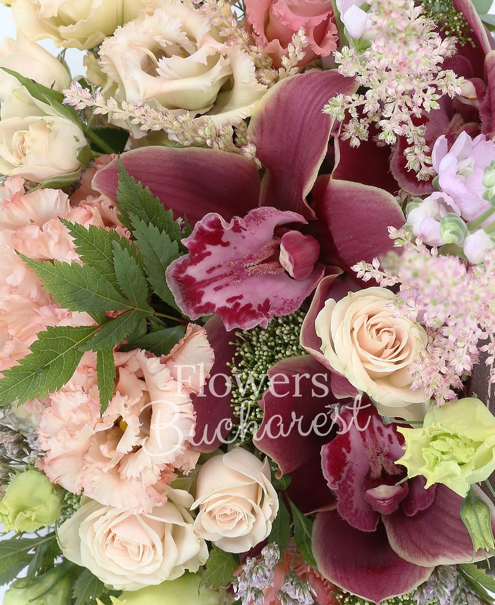 3 pink lisianthus, 2 green lisianthus, 3 cream miniroses, 2 purple mathiolla, garnet cymbidium, 3 pink astilbe, greenery