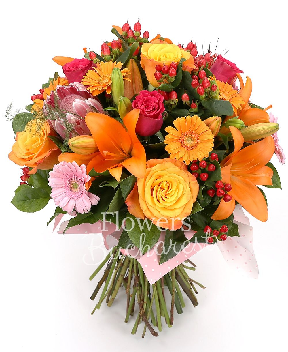 3 orange lilies, 3 proteea, 5 orange roses, 3 cyclam roses, 3 pink gerbera, 5 orange gerbera, 3 leucospermum, 5 hypericum, greenery