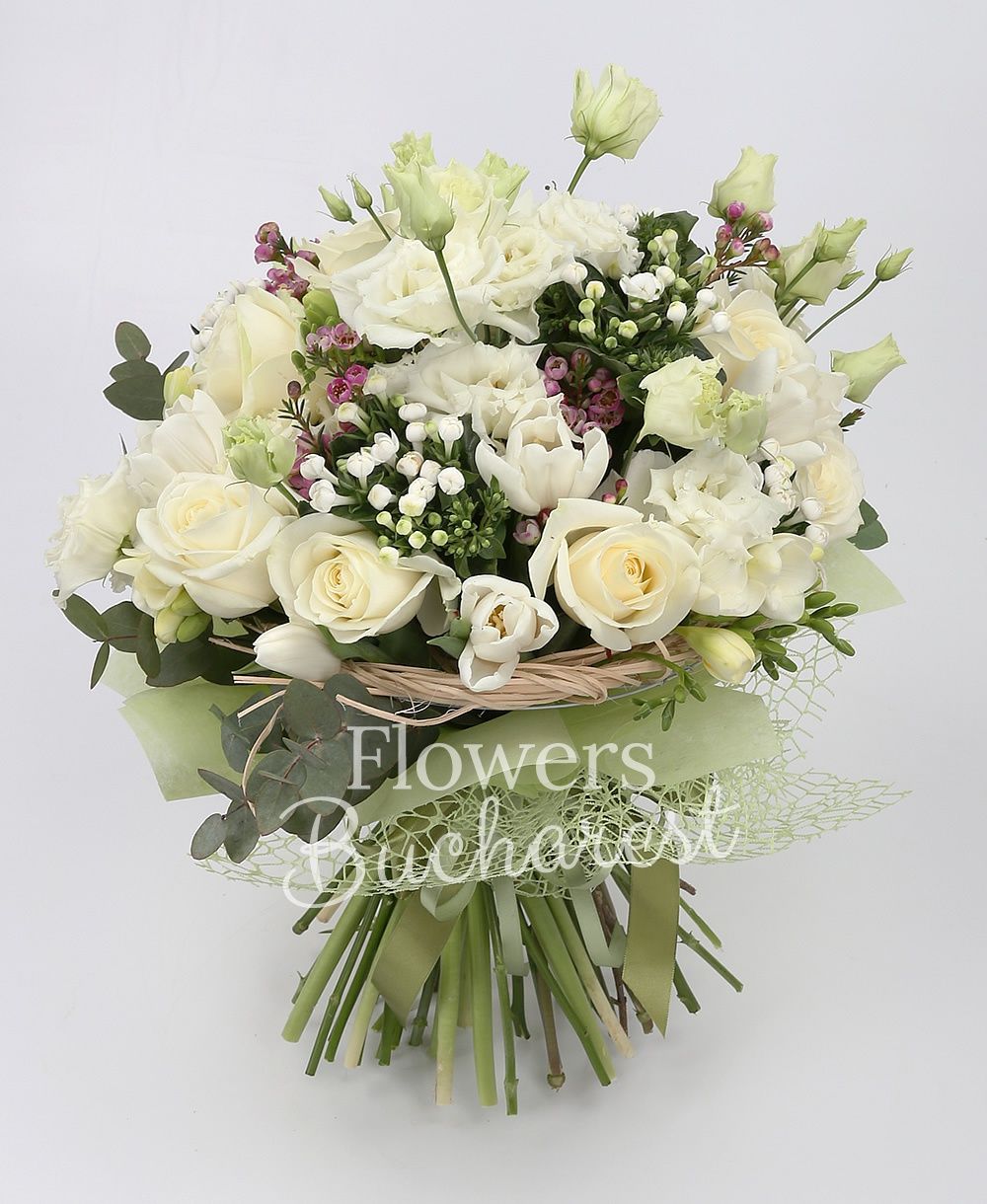 9 white roses, 5 white lisianthus, 10 white tulips, 5 white bouvardia, 10 white freesias, greenery