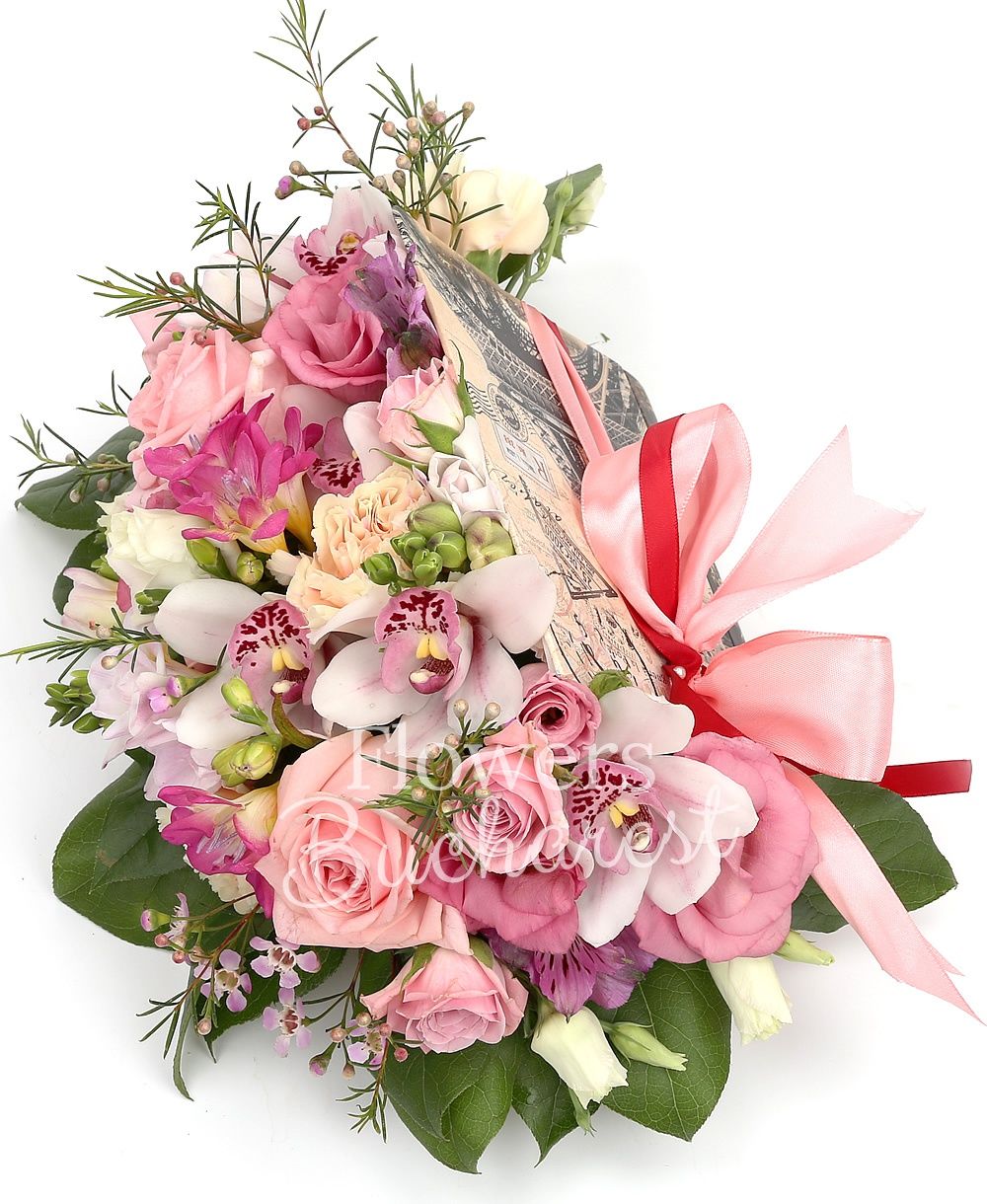 3 pink roses, 3 pink miniroses, 3 cream carnations, 5 cyclam freesias, 2 mauve alstroemeria, white cymbidium, 2 pink lisianthus, pink waxflower, greenery