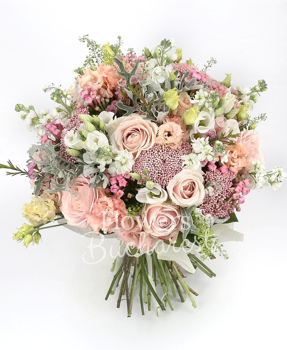 10 pink roses, 10 white matthiola, 5 pink lisianthus, 10 pink bouvardia, 5 rice flower, 5 white lisianthus, 3 agapanthus, greenery