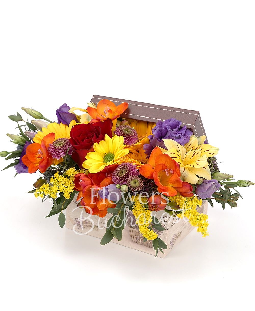 5 orange freesias, 5 yellow gerberas, purple lisianthus, yellow alstroemeria, purple chrysanthemum, solidago, eryngium, greenery