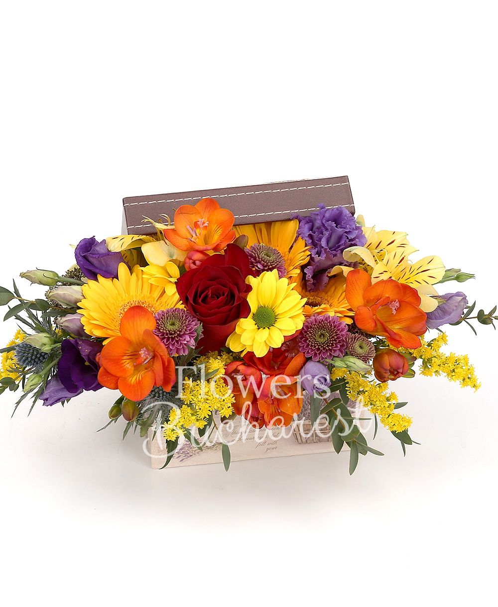 5 orange freesias, 5 yellow gerberas, purple lisianthus, yellow alstroemeria, purple chrysanthemum, solidago, eryngium, greenery