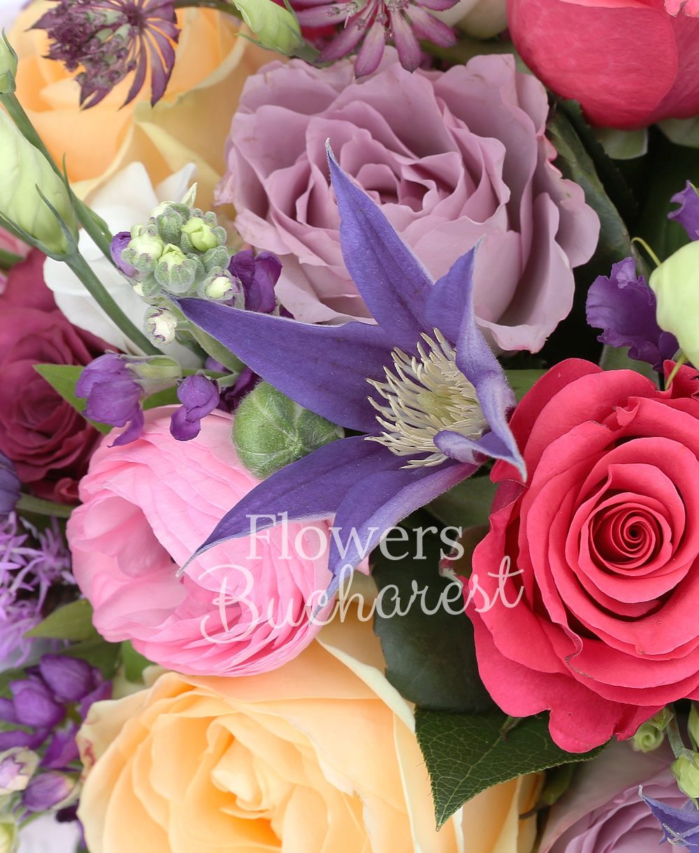 6 red roses, 5 cyclam roses, 5 mauve roses, 5 lila roses, 9 mauve matthiola, 5 red astranția, 3 pink lisianthus, 3 white lisianthus, 10 pink ranunculus, 3 clematis, 2 mauve lisianthus, 3 mauve liatris, greenery