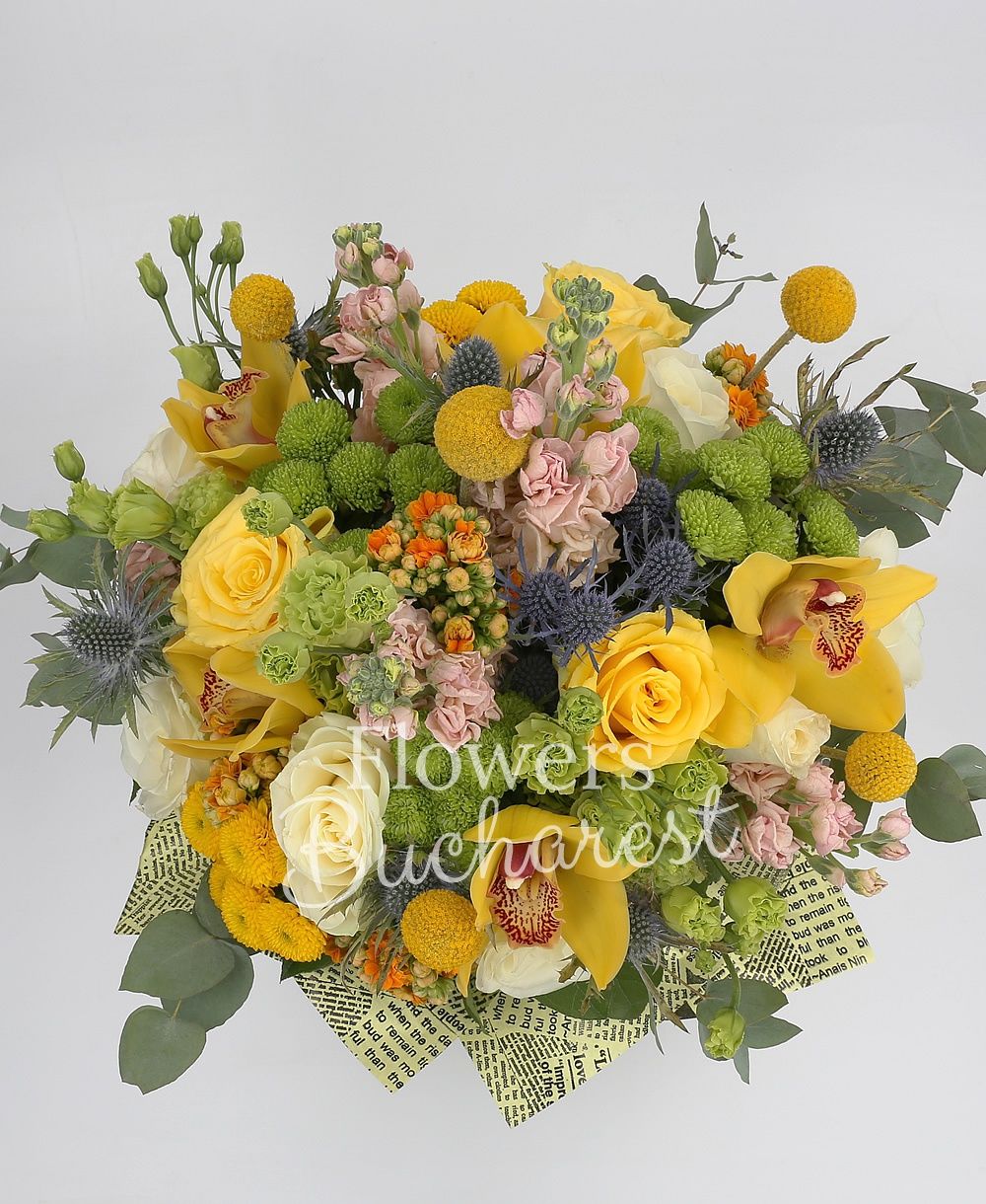 5 yellow roses, 5 cream roses, 5 yellow santini, 5 green santini, 7 cream matthiola, 5 craspedia, 3 eryngium, 3 green lisianthus, 5 orange kalanchoe, yellow cymbidium, greenery