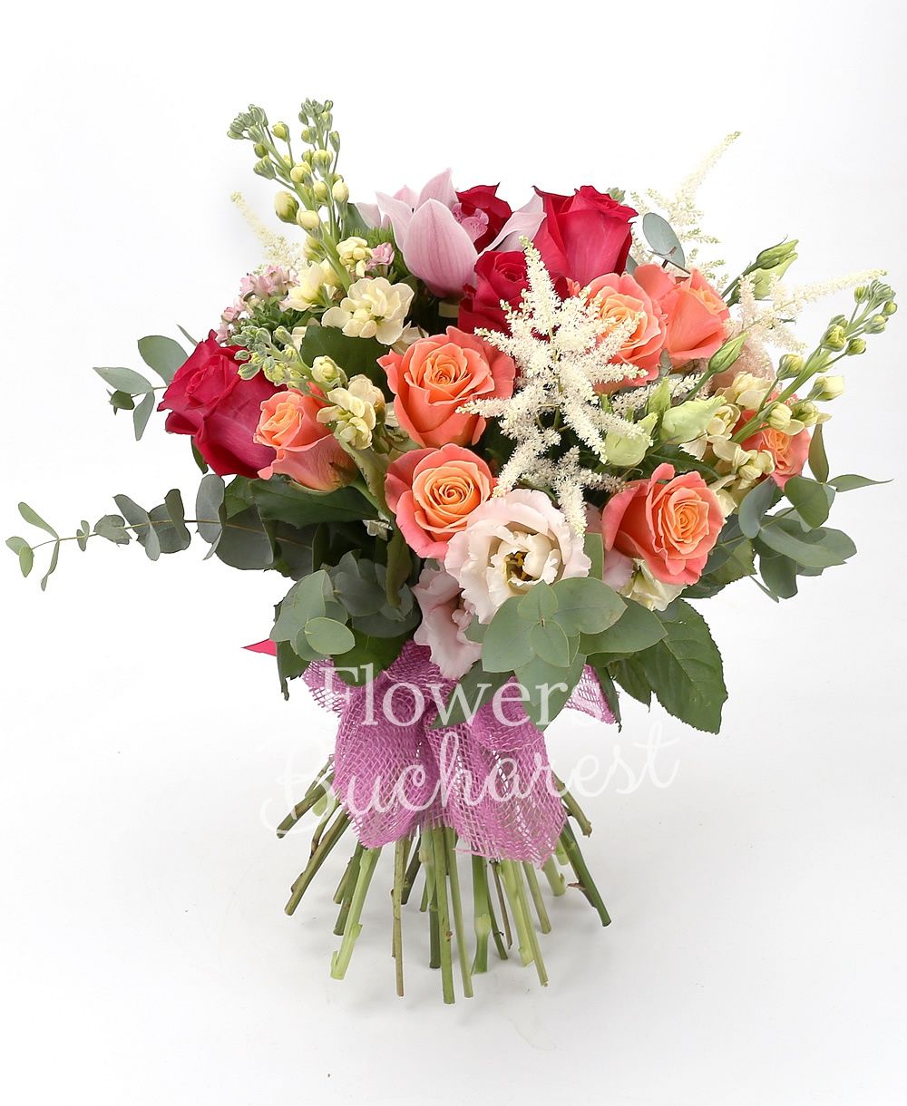 9 miss piggy roses, 5 cyclam roses, 5 pink bouvardia, 5 cream matthiola, 3 pink lisianthus, 5 white astilbe, 5 green carnations, pink cymbidium, greenery