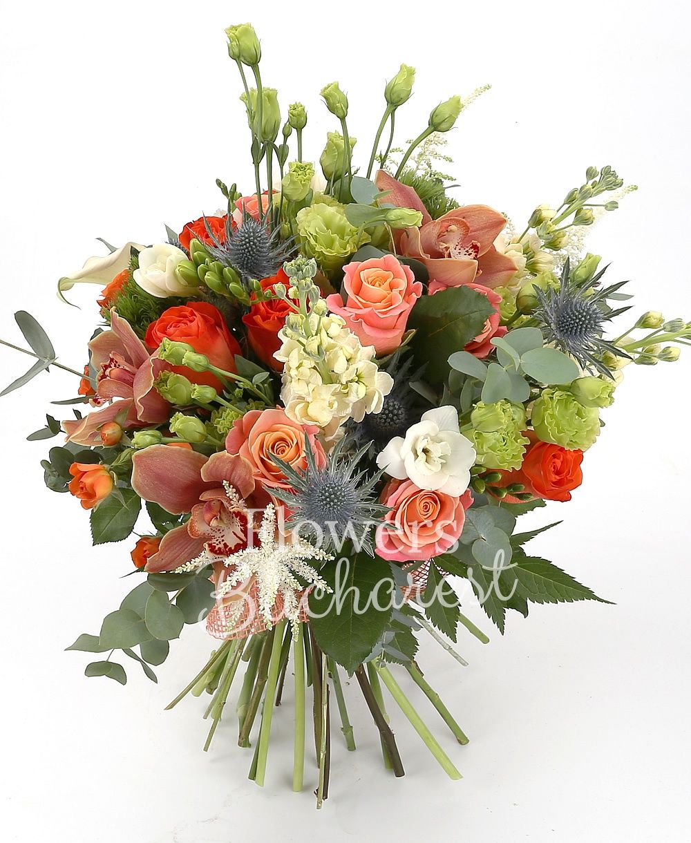 10 miss piggy roses, 5 orange miniroses, 5 white cala, 5 orange roses, 5 green lisianthus, 5 cream matthiola, 10 white freesias, 2 eryngium, 5 green carnations, garnet cymbidium, greenery