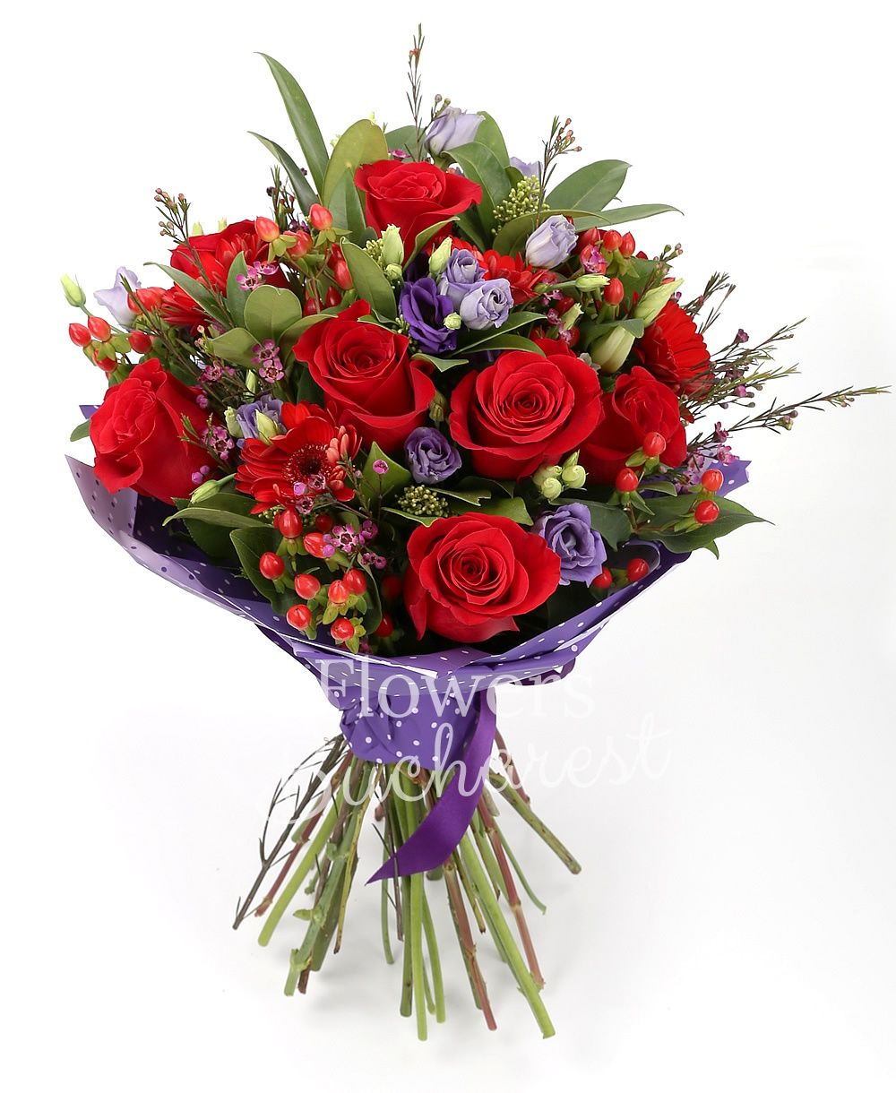 9 red roses, 9 red gerbera, 7 mauve lisianthus, 10 red hypericum, 5 waxflower, 5 schimia, greenery