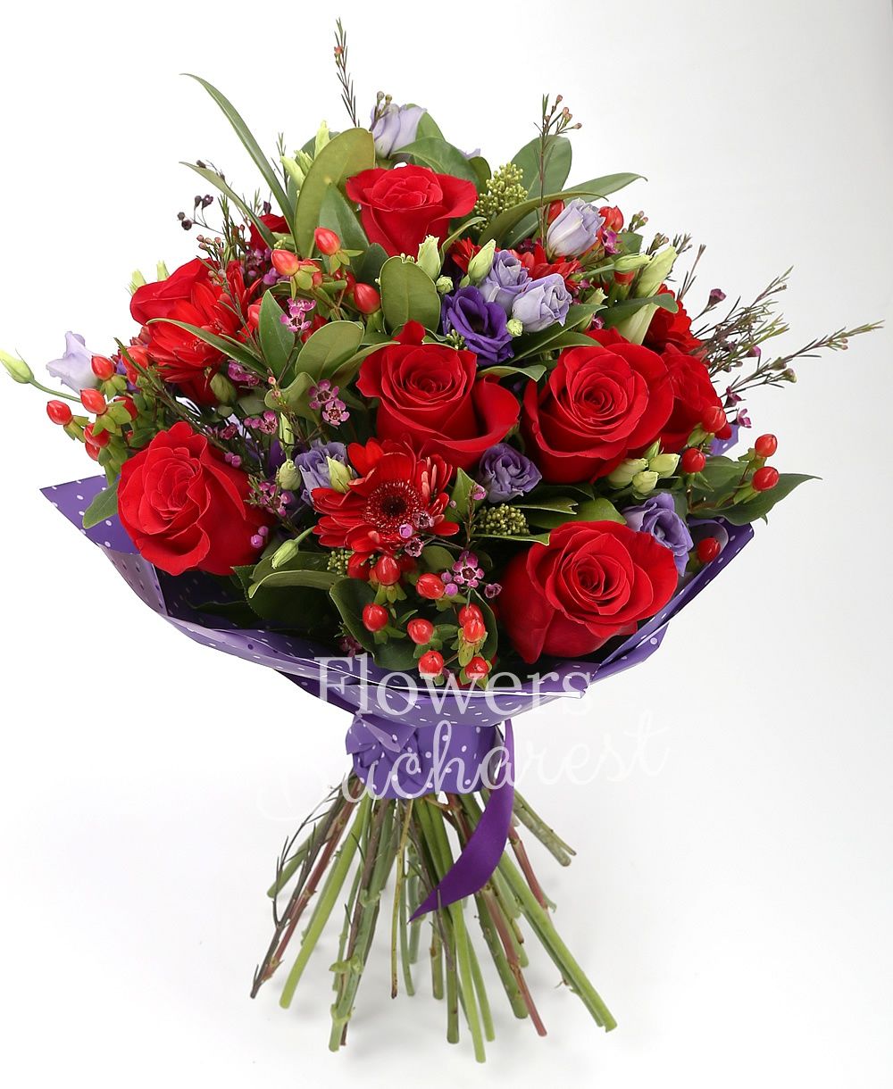 9 red roses, 9 red gerbera, 7 mauve lisianthus, 10 red hypericum, 5 waxflower, 5 schimia, greenery
