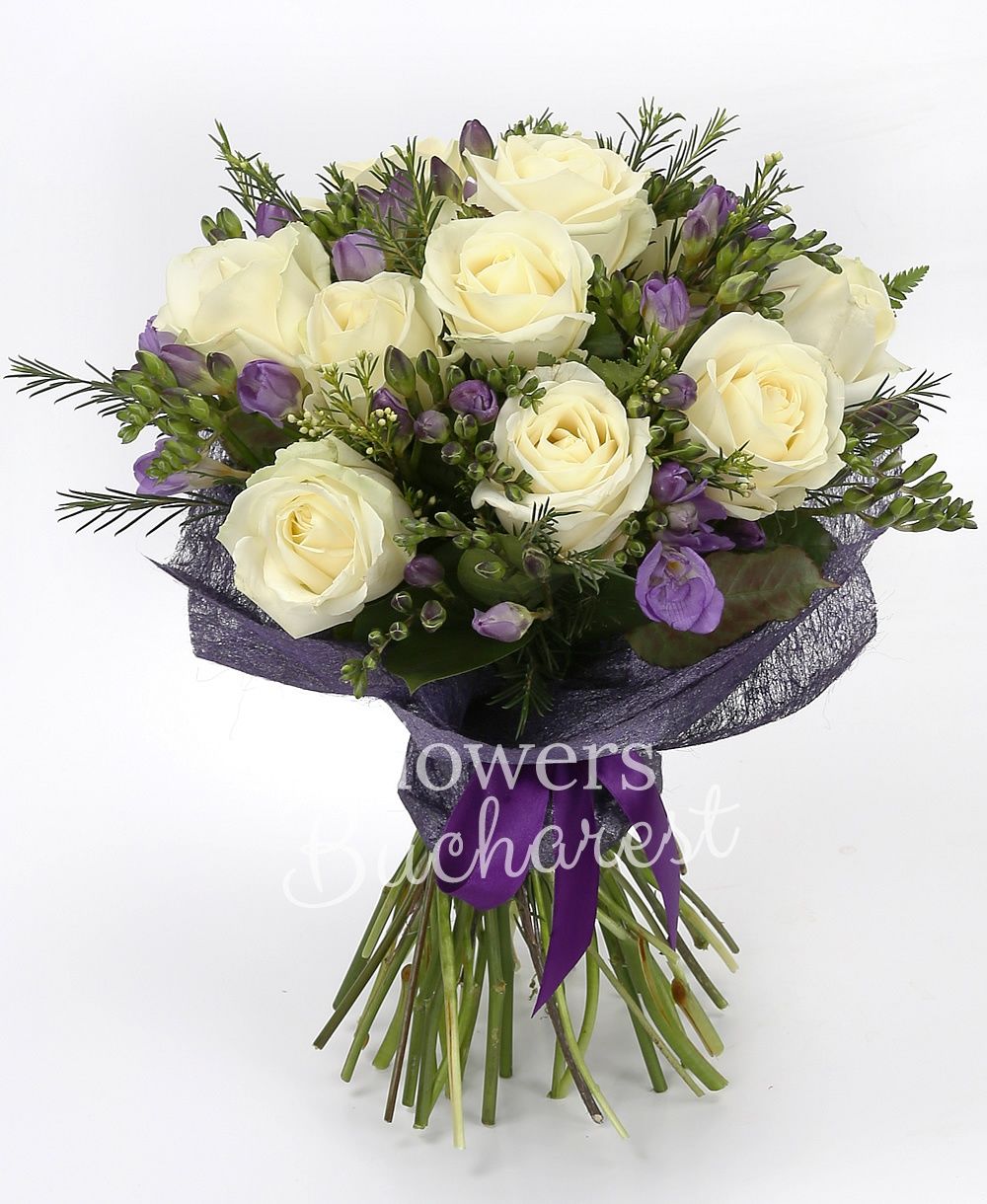 10 white roses, 20 mauve freesias, greenery