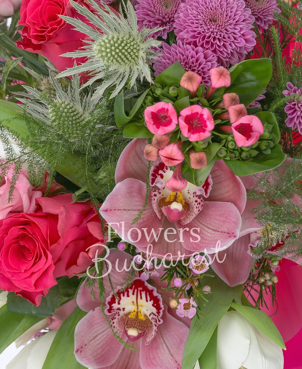 3 pink roses, 3 pink bouvardia, 3 white eryngium, 5 white tulips, 3 white lisianthus, pink cymbidium, 3 pink santini, greenery