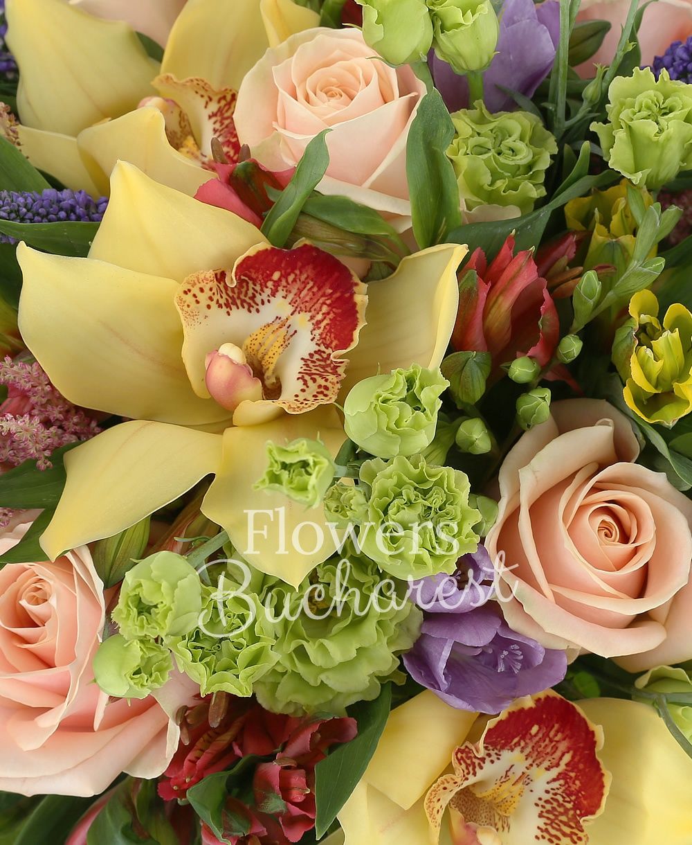 9 cream roses, 6 red alstroemeria, 10 mauve freesias, 5 pink astilbe, 10 mauve veronica, 6 green lisianthus, 5 yellow alstroemeria, yellow cymbidium, greenery