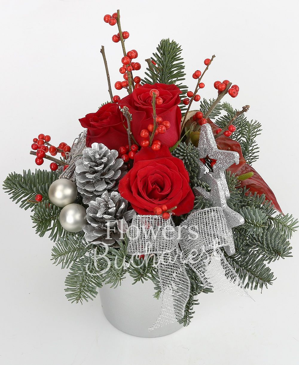 3 red roses, 2 red anthurium, globes, stars, dried orange slices, greenery