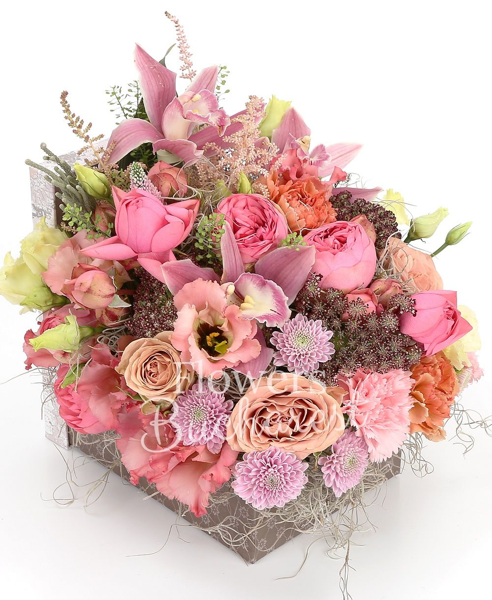 7 piano roses, 5 carnations, 5 cappuccino roses, 3 lisianthus, 3 astilbe, 2 pink santini, pink cymbidium, greenery