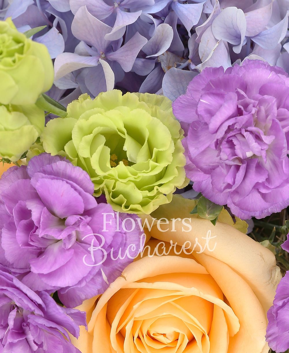 3 peach roses, 3 green lisianthus, blue hydrangea, 5 mauve carnations, 2 solidago, 3 statice, greenery