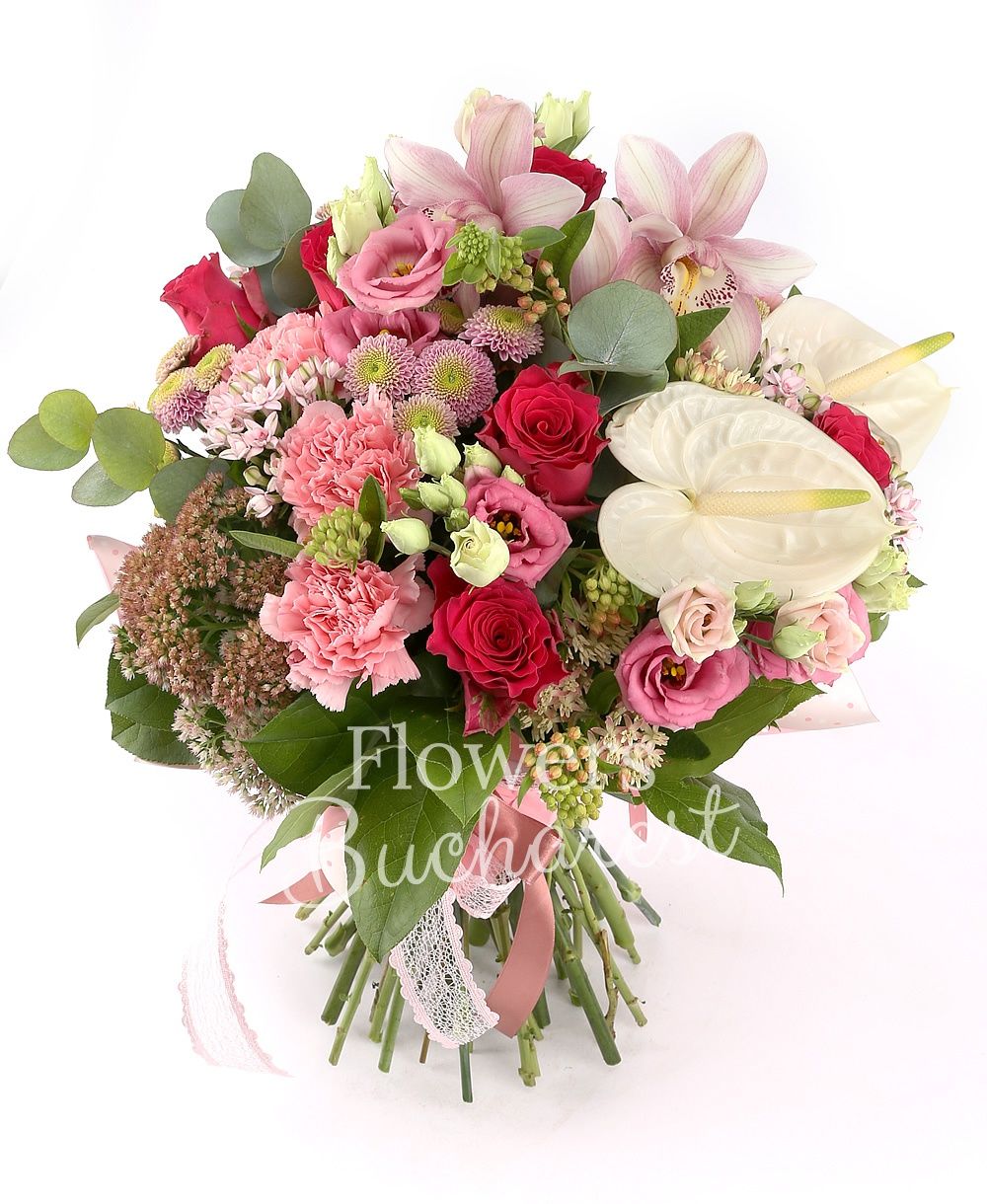 7 red roses, 5 pink bouvardia, 5 pink carnations, 5 pink santini, 2 white anthurium, pink cymbidium, greenery