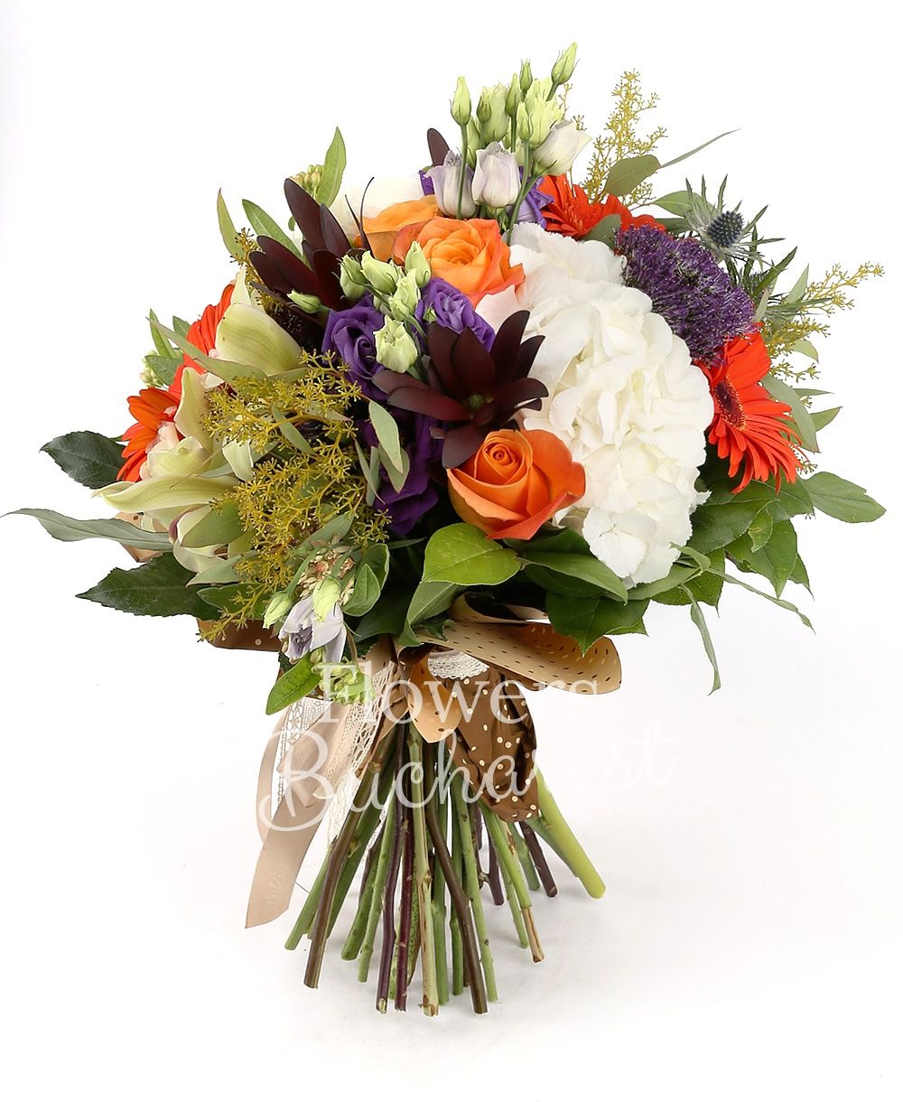 5 orange roses, 3 leucadendrons, 3 orange gerberas, 2 white hydrangeas, 3 purple trachelium, 3 purple lisianthus, 3 green hypericum, 2 eryngium, green cymbidium, greenery