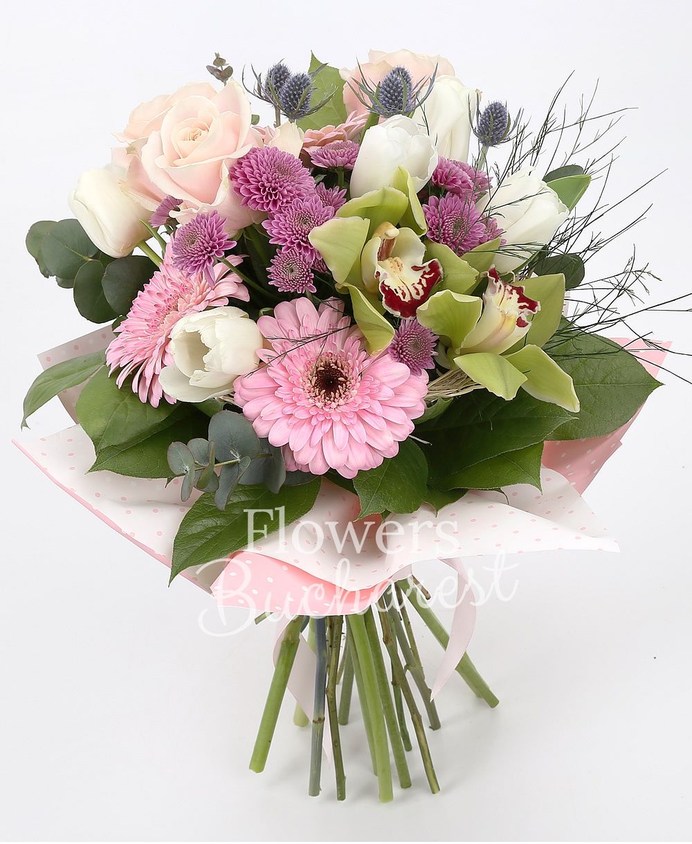 3 pink roses, 2 pink gerbera, 5 white tulips, 2 pink santini, 2 eryngium, green cymbidium, greenery