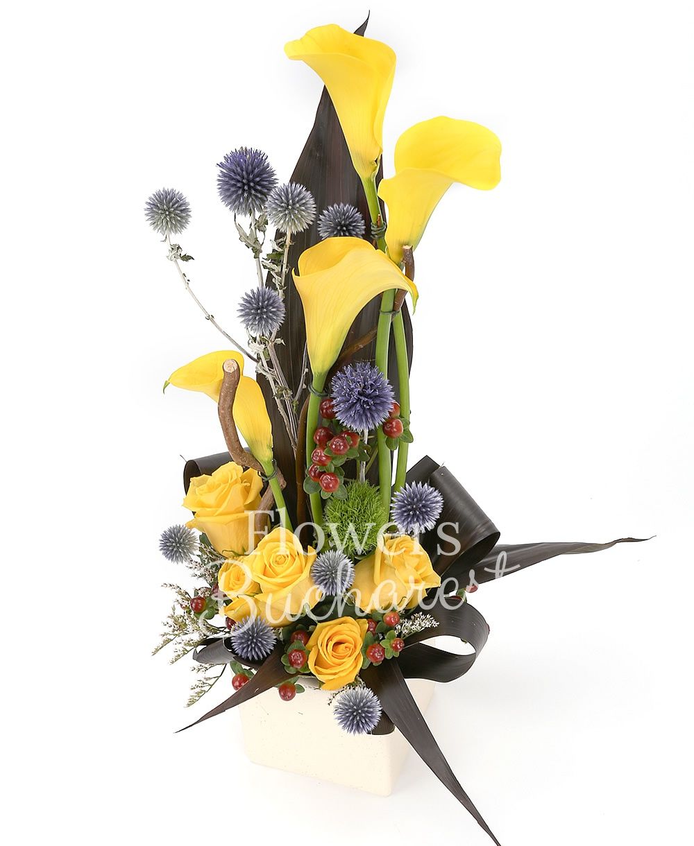 5 yellow roses, 4 yellow cala, 3 hypericum, 2 grey dianthus, greenery