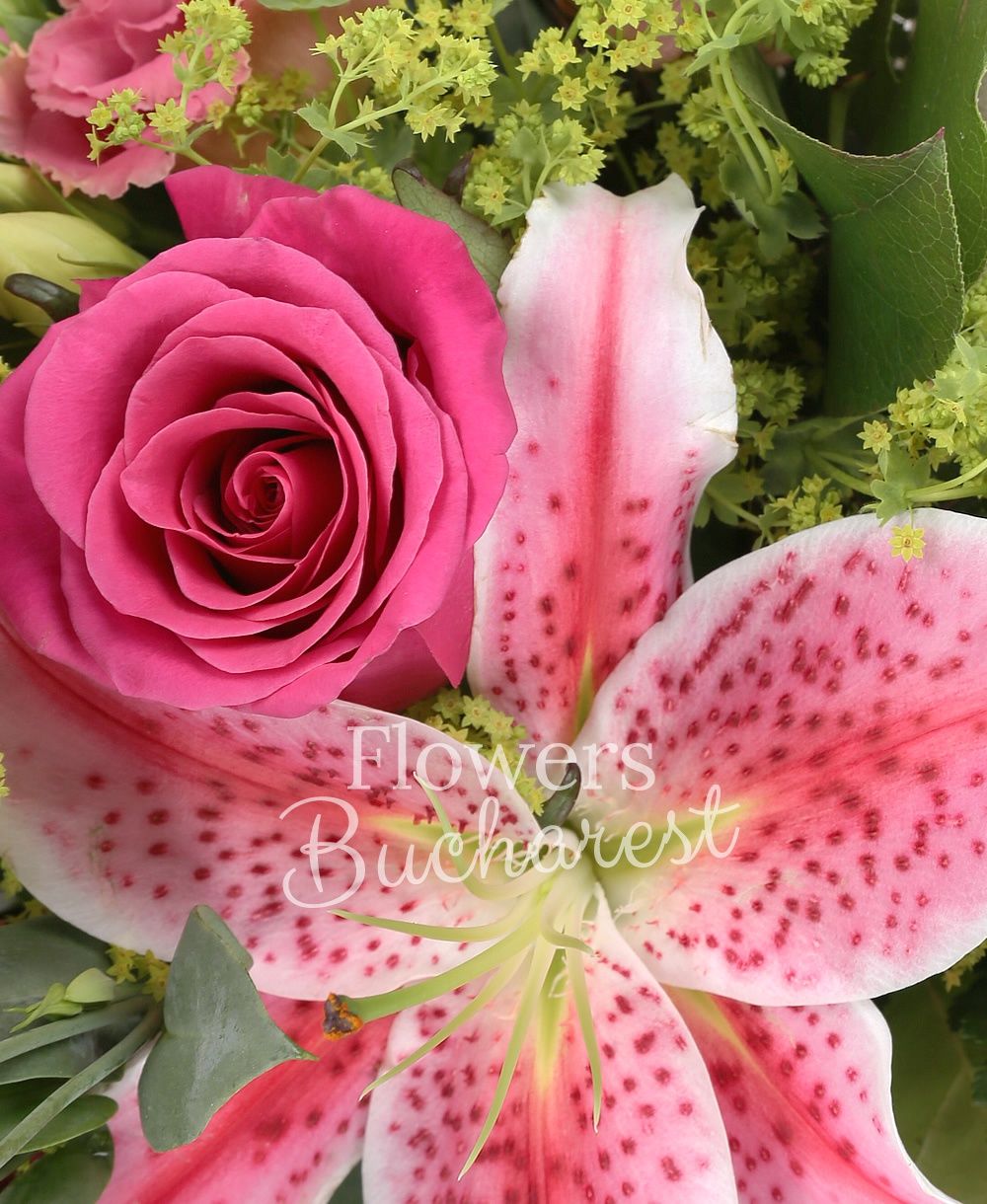 3 pink roses, 3 pink lisianthus, 1 lily, greenery