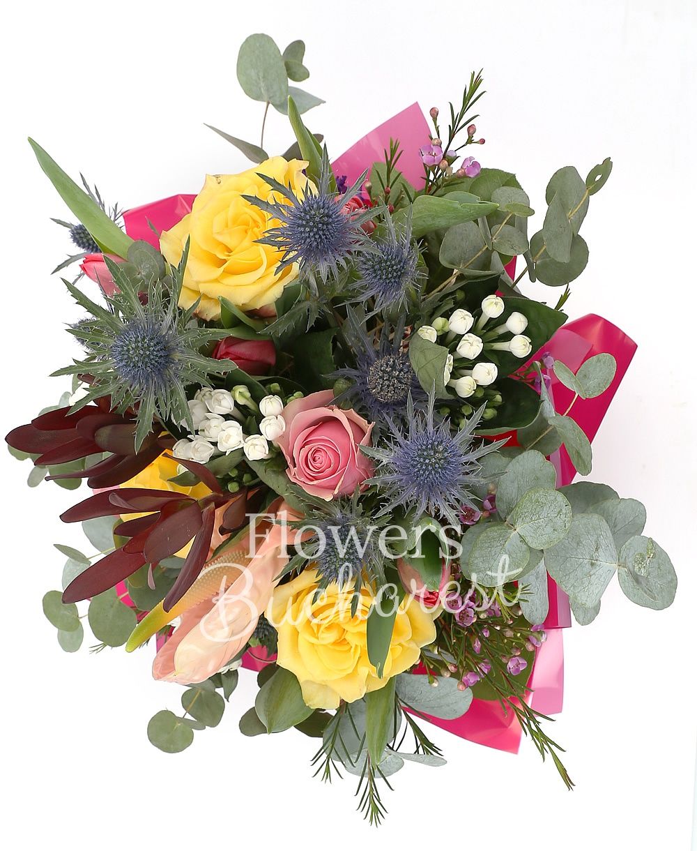 1 pink anthurium, 3 yellow roses, 3 pink roses, 3 eryngium, 2 leucadendron, 3 white bouvardia, 5 red tulips, greenery