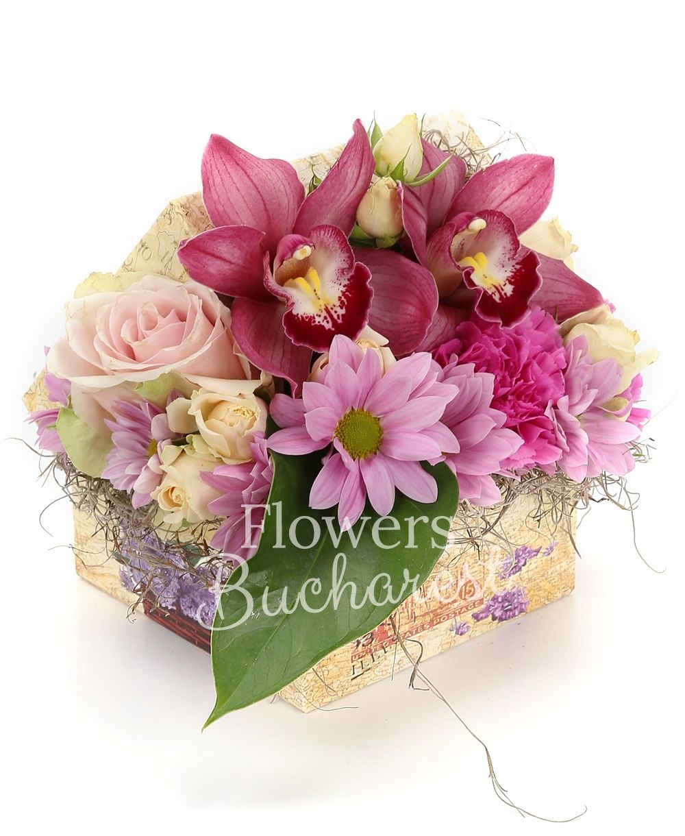 2 pink cymbidium, 2 peach avalanche roses, 2 miniroses, 3 carnations, 1 pink chrysanthemum, greenery