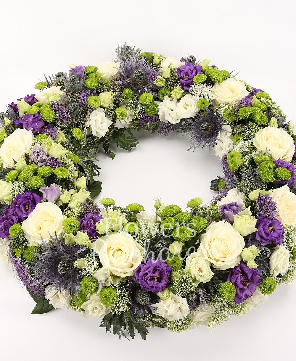 10 white roses, 10 eryngium, 10 white trachelium, 10 mauve trachelium, 10 mauve lisianthus, 10 white lisianthus, 15 santini