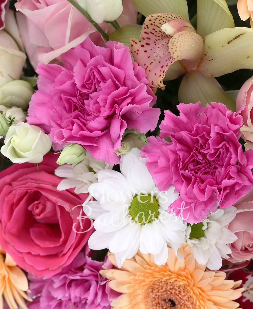 5 white bouvardia, 8 cream gerbera, 12 pink carnations, 10 white roses, 5 pink roses, 3 cyclam roses, 2 white chrysanthemums, 5 white lisianthus, pink cymbidium, green cymbidium, basket