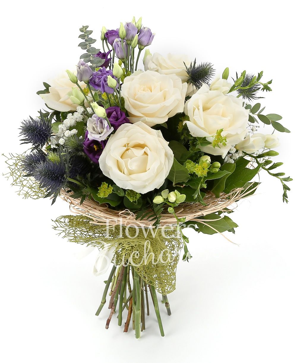 5 white roses, 3 purple lisianthus, 3 eryngium, 7 white freesias, greenery