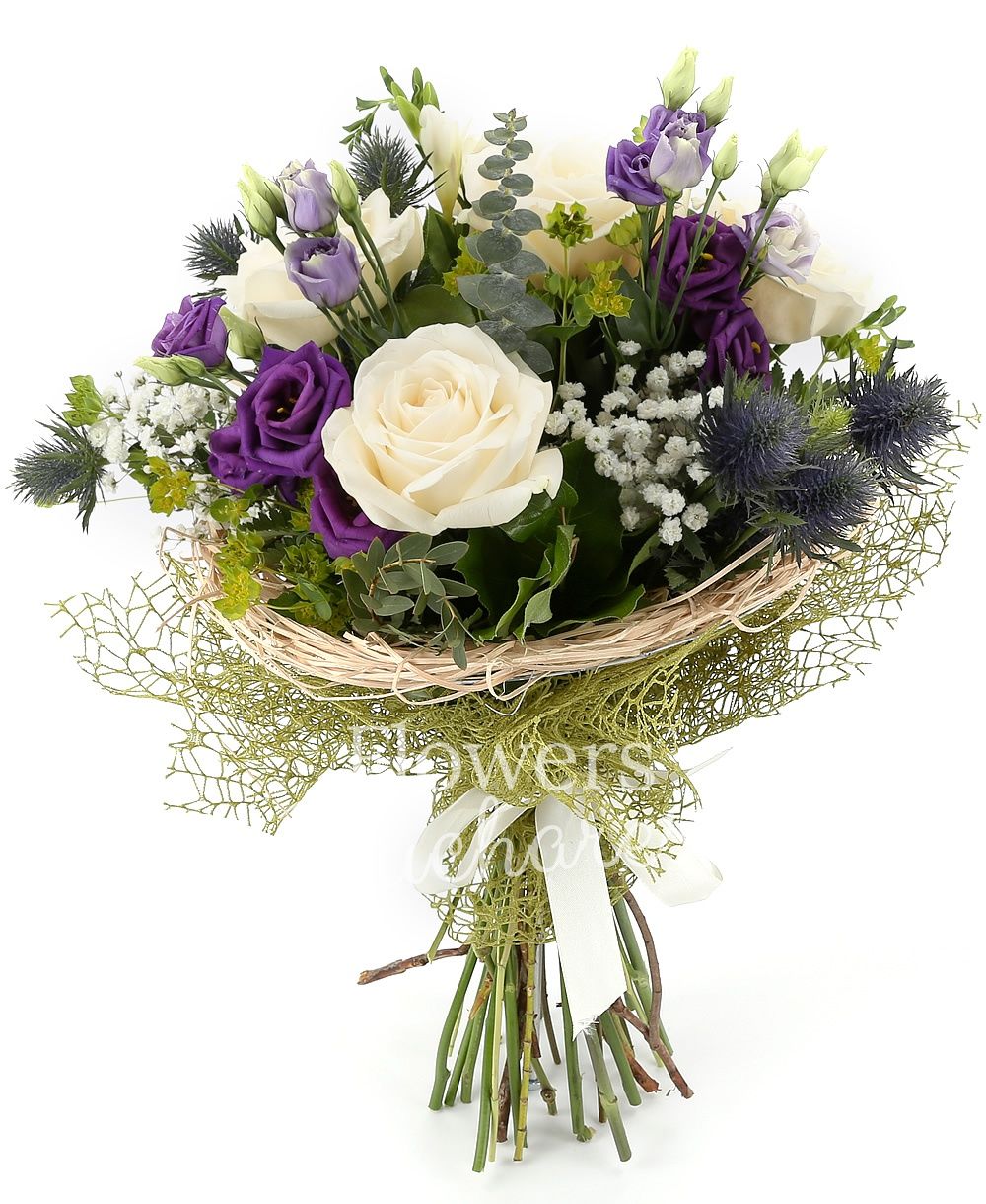 5 white roses, 3 purple lisianthus, 3 eryngium, 7 white freesias, greenery