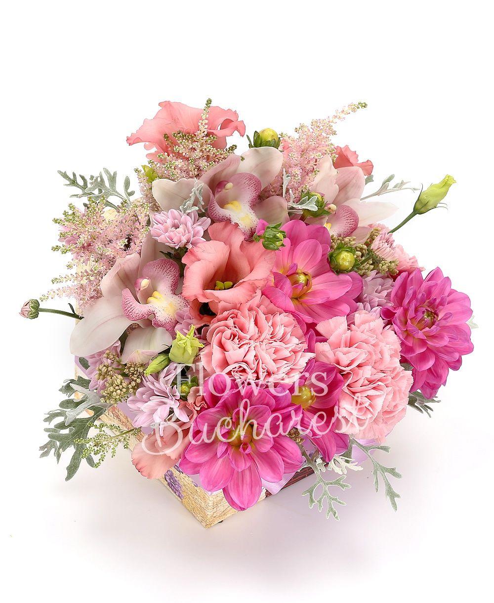 3 pink astilbe, 3 pink dahlias, 3 pink carnations, 2 pink lisianthus, 1 pink chrysanthemum, white cymbidium, greenery