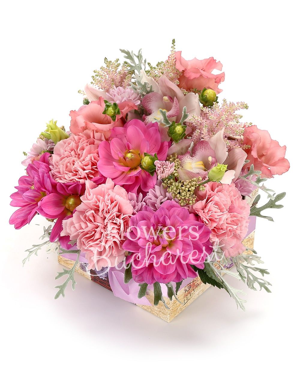 3 pink astilbe, 3 pink dahlias, 3 pink carnations, 2 pink lisianthus, 1 pink chrysanthemum, white cymbidium, greenery