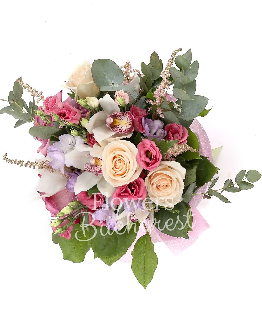 3 cream roses, 5 pink lisianthus, 3 purple roses, 5 pink astilbe, 5 purple freesias, white cymbidium, greenery