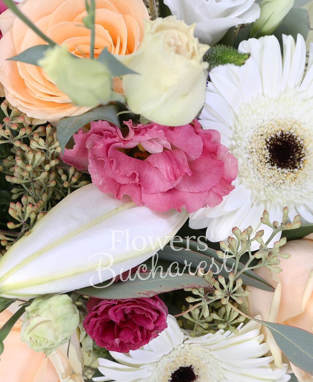 1 white lily, 3 peach roses, 3 white lisianthus, 3 pink lisianthus, 3 white gerberas, 5 veronica, 3 craspedia, 3 white trachelium, greenery