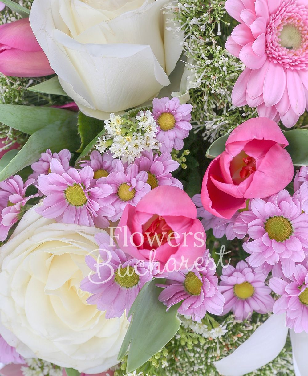 3 white roses, 5 pink gerberas, white cymbidium, 10 pink tulips, 4 white trachelium, 5 pink santini, 2 solidago, greenery