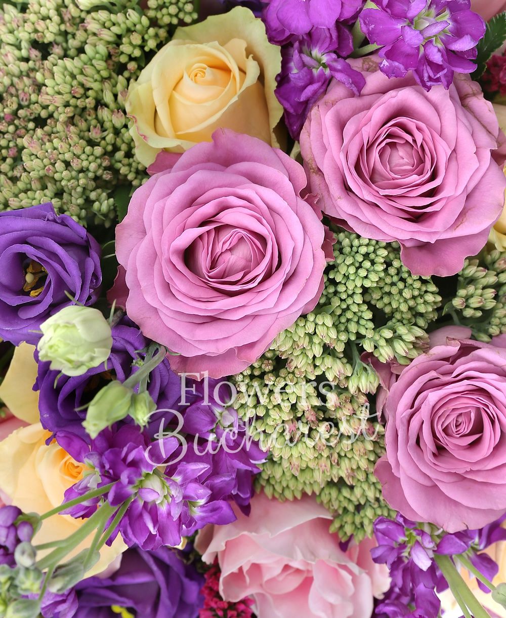9 purple roses, 7 banana roses, 5 pink roses, 7 purple matthiola, 6 purple lisianthus, 5 sedum, greenery