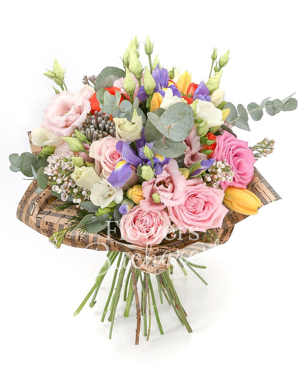 3 pink roses, 5 pink lisianthus, 2 white waxflower, 5 brunia, 5 iris, 3 orange miniroses, 5 yellow tulips, 5 white freesias, greenery