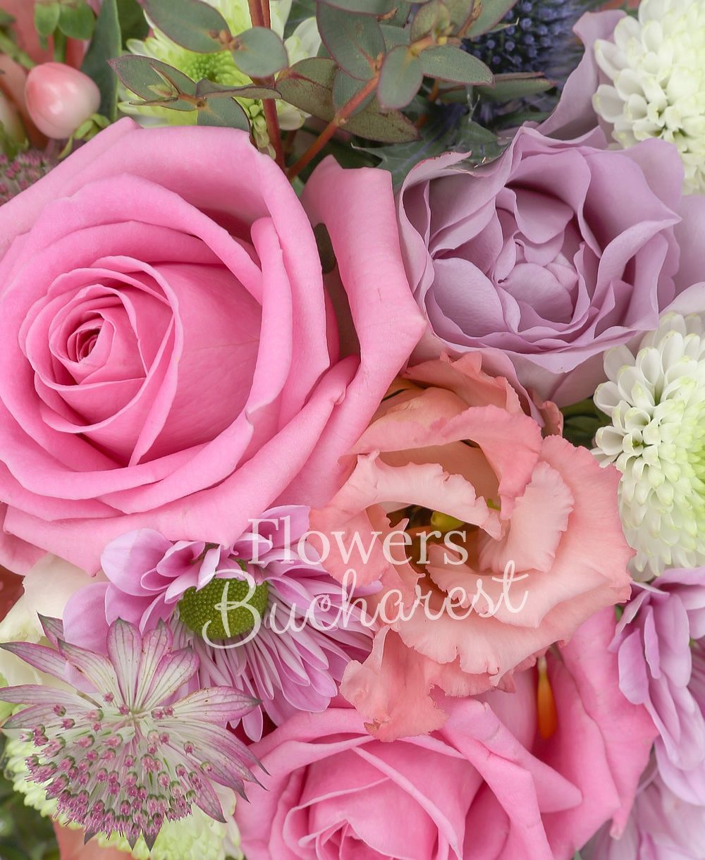 3 pink roses, 2 pink hypericum, 2 mauve roses, 1 eryngium, 1 white santini, 2 pink lisianthus, 2 pink astilbe, 1 gypsophilla, 1 mauve chrysanthemum
