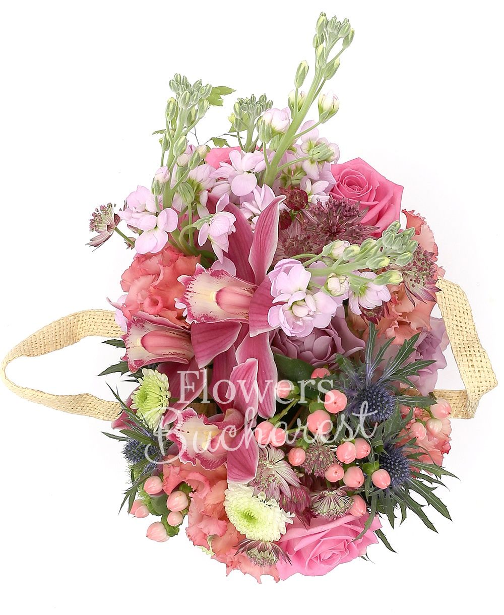 3 pink roses, 2 mauve roses, 1 eryngium, 1 white santini, 3 mauve matthiola, pink cymbidium, 3 pink hypericum, 2 pink astilbe, 3 pink lisianthus, 2 green carnations