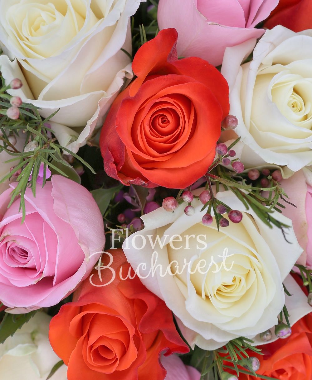 7 white roses, 7 pink roses, 7 orange roses, 5 pink waxflower, 10 aspidistra, greenery