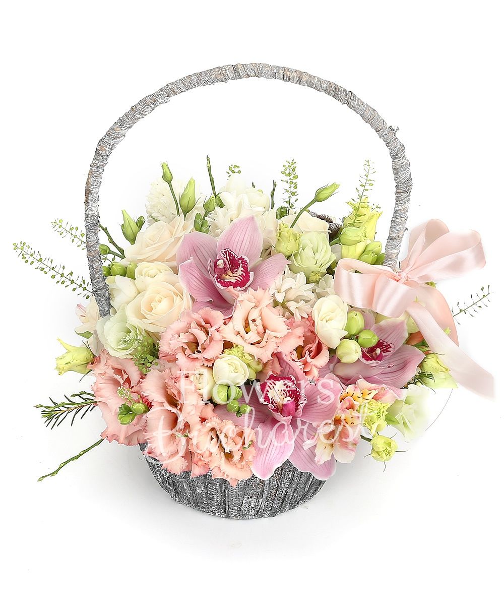 5 cream roses, 2 white lisianthus, 3 pink lisianthus, pink cymbidium, 3 white hyacinthus, 10 white freesias, basket