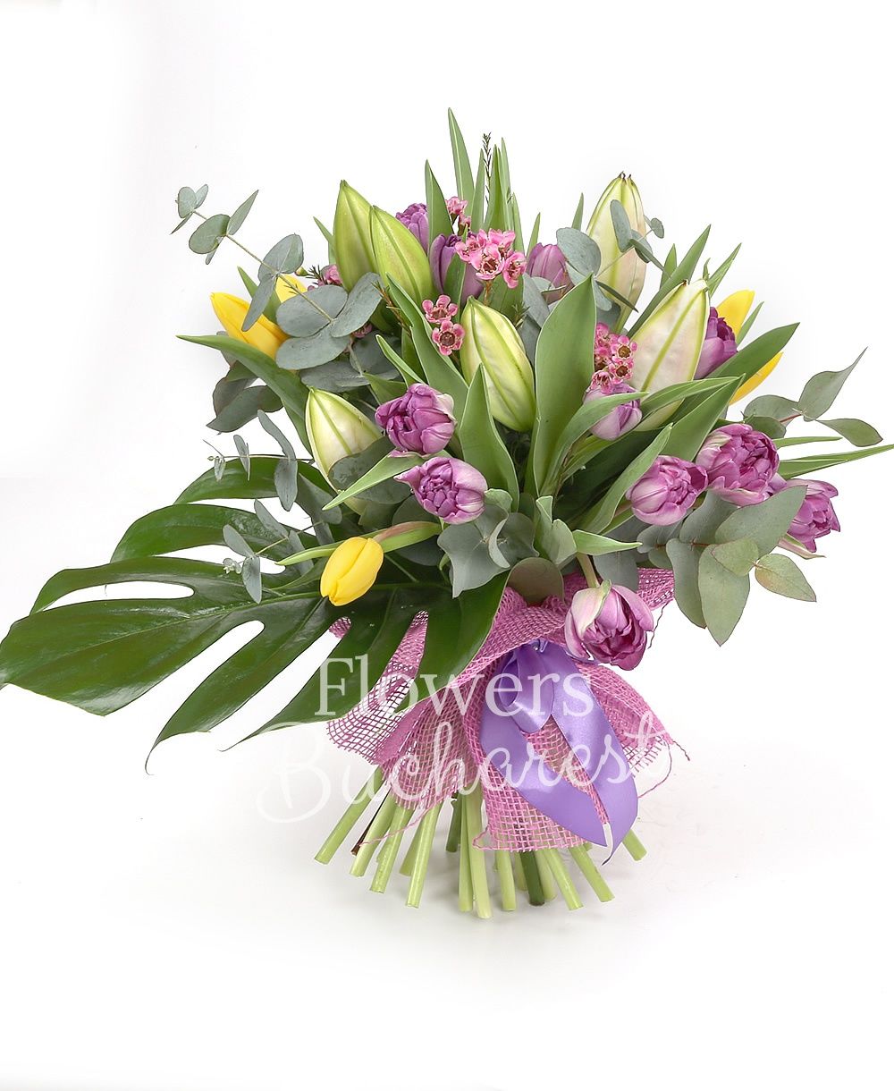 2 imperial pink lilies, 10 yellow tulips, 15 purple tulips, 2 pink waxflowers, greenery