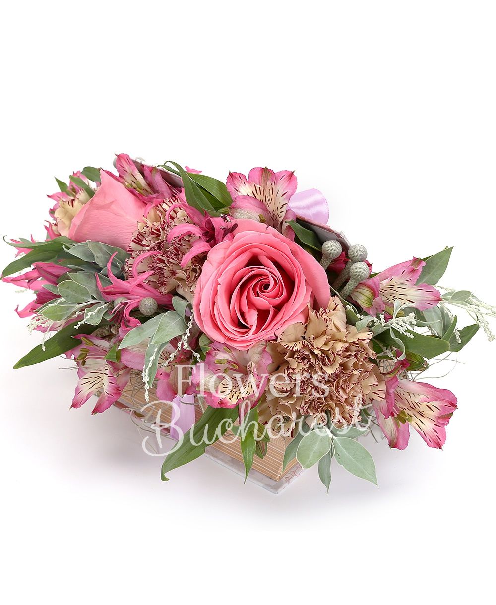 2 pink roses, 3 carnations, 2 pink nerines, 2 pink alstroemeria, brunia, acacia