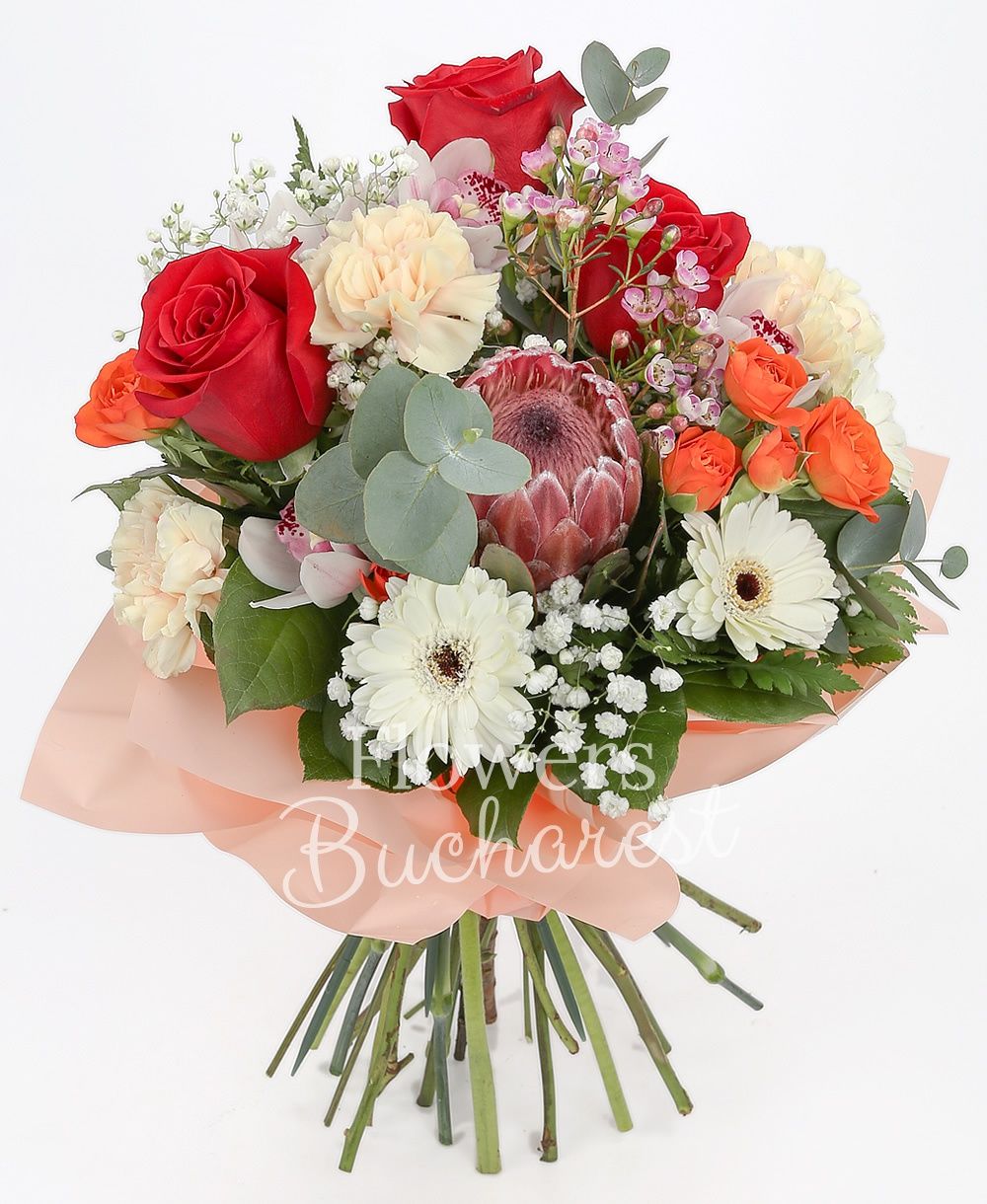 3 red roses, 3 orange miniroses, 1 proteea, 2 white gerbera, 2 cream carnations, white cymbidium, greenery