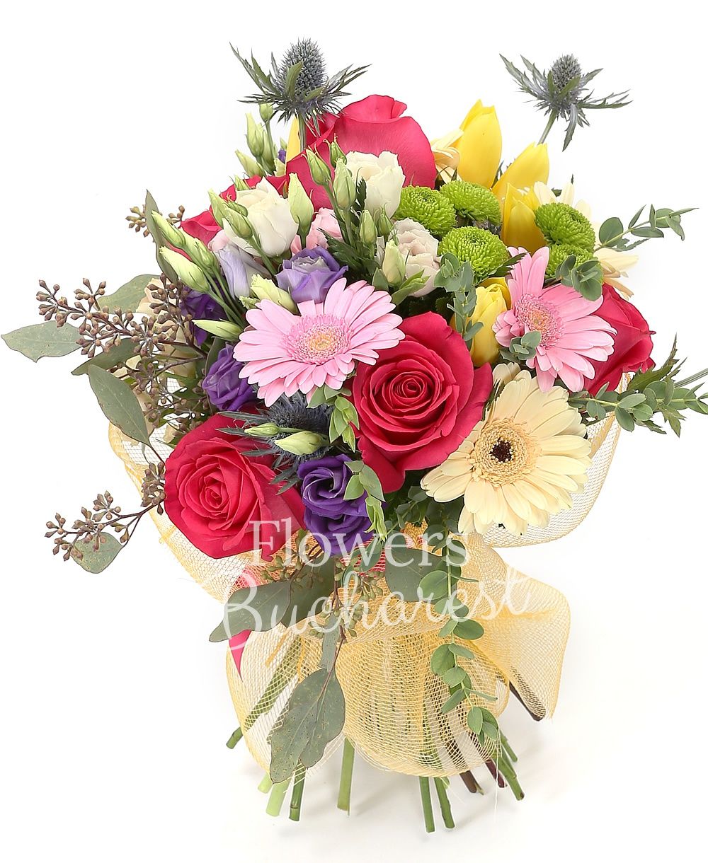 5 cyclam roses, 3 pink lisianthus, 3 mauve lisianthus, 5 yellow tulips, 2 eryngium, 3 cream gerbera, 2 pink gerbera, 3 cream miniroses, greenery