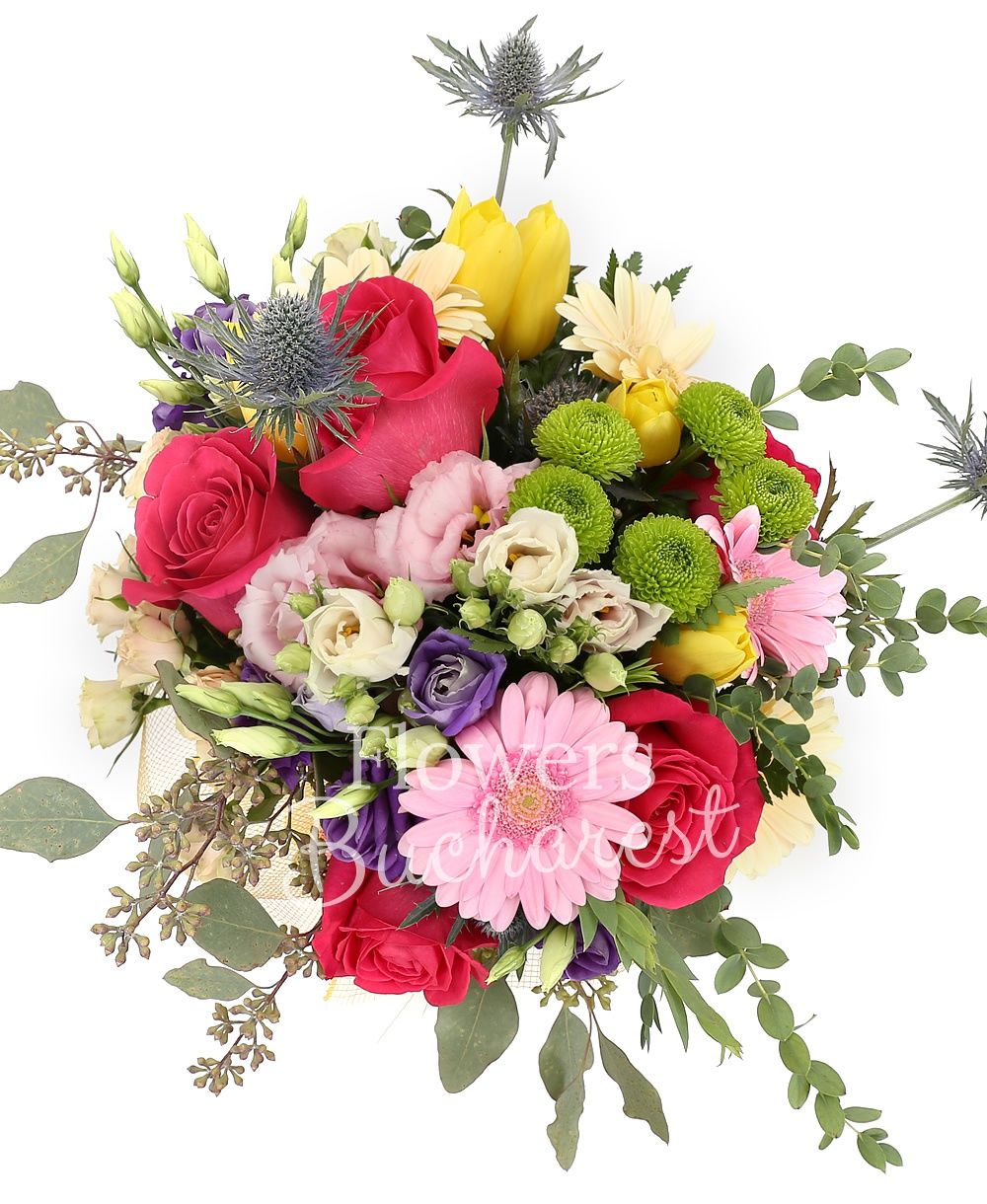 5 cyclam roses, 3 pink lisianthus, 3 mauve lisianthus, 5 yellow tulips, 2 eryngium, 3 cream gerbera, 2 pink gerbera, 3 cream miniroses, greenery